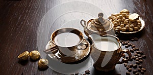 Fragrant coffee with sweets on the table