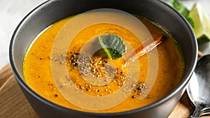 Fragrant Homemade Pumpkin Soup tasty. Fresh carrot ginger soup. Food recipe background. Close up