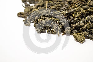 Fragrant, peppery, green tea on a white background. Side view