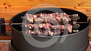 Fragrant shish kebab Shashlik is roasted on skewers on the gas grill