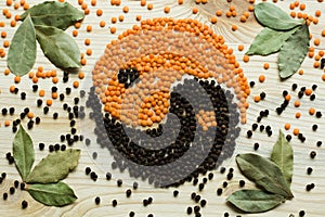 Fragrant spices and beans in the form of a yin yang sign