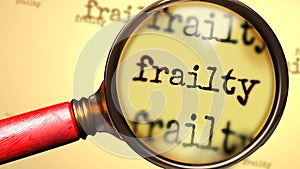 Frailty and a magnifying glass on English word Frailty to symbolize studying, examining or searching for an explanation and photo