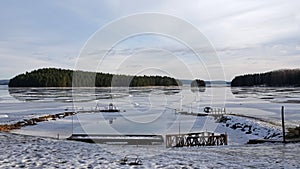 Framby Udde point at Frozen Runn lake near Falun in Sweden