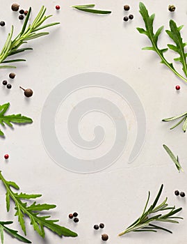 A frame border italian cooking background old parchment with fresh mediterranean herbs leaves allspice rosemary arugula