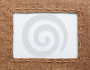 Frame of burlap, lies on a white background