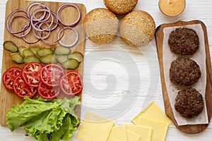 Frame of cheeseburger ingredients, top view