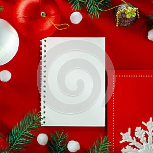 Frame of Christmas decoration on red background top view