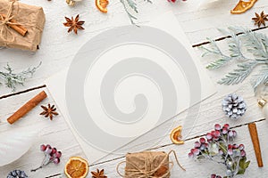 Frame, Christmas, New Year. Background with composition, with empty postcard space for design. On a white wooden background