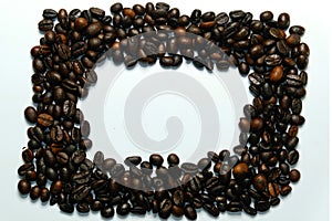 Frame coffee bean with pictures beautifu.l background view from the side wooden table. The concept