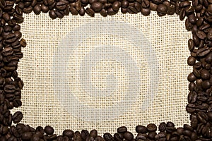 Frame from coffee beans on burlap