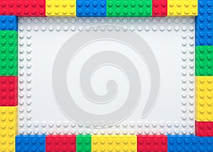 Frame of colorful toy bricks