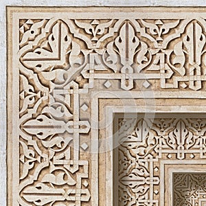 Frame composition of typical handcraft maroccan plaster decorations with with a geometric and natural shape