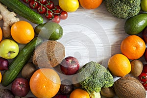 Frame of different fresh organic fruits and vegetables. Top view. Flat lay.
