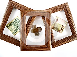 Frame with the dollar, the ruble and the coins are in rubles in the framework. Concept of financial investment and money saving.
