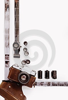 Frame with films and vintage film camera