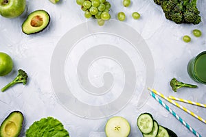 Frame flatlay arrangement with various green fruits and vegetables