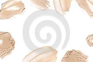 Frame from foundation smears, bb cream for makeup isolated on white background. Foundation face make-up samples, texture of face
