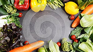 Frame of fresh organic vegetables background on table, Healthy food concept top view.