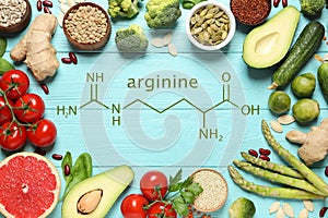 Frame of fresh vegetables, fruits and seeds on blue wooden table, flat lay. Sources of essential amino acids