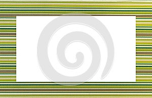 Frame with green, yellow fnd brown horizontal stripes and a white midlle photo