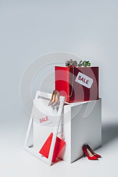 frame, high heels ans sale signs on cubes, summer