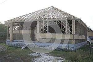 Frame house made of straw.