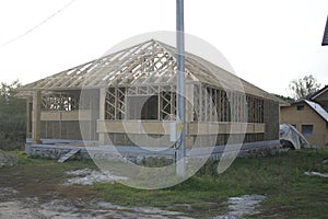 Frame house made of straw. Facade