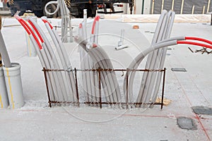 Frame house under construction. Closeup of plastic tubes.