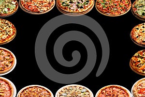 Frame for lettering and design from a set of pizzas isolated on a black background.. Copy space