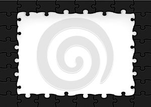 Frame made of black puzzle pieces