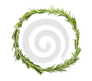 Frame made of fresh rosemary twigs on white background