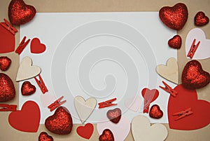 Frame Made of Paper Red Hearts with copy space. Blank Paper for text Mesage arrounded with hearts. Valentine`s Day Top view, love