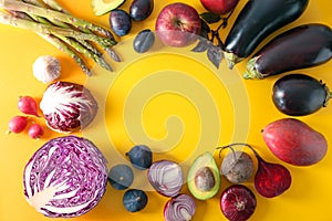 Frame made of various fresh vegetables and fruits on color background