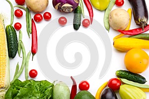 Frame made of various fresh vegetables on white background