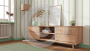 Frame mock up in modern cozy living room with wooden chest of drawers, striped wallpaper in white and green tones, window and