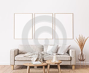 Frame mockup in farmhouse living room design, white furniture on bright wall background photo