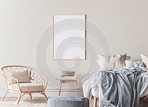 Frame mockup in Scandinavian bedroom design, wooden bed, blue plaid, and rattan armchair.