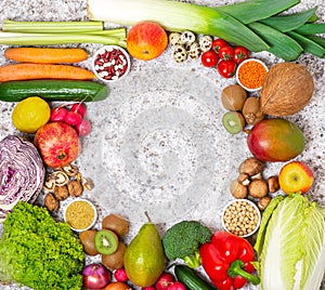Frame of Organic food on a black background. Fresh vegetables, fruits,cereals and legumes.Vegan and vegetarian concept