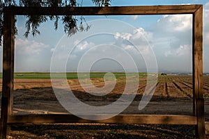 A frame that overlooks cultivated fields