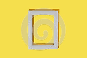 Frame for photo or painting on bright illuminating yellow background. Mockup. Place to insert text, images. Top view