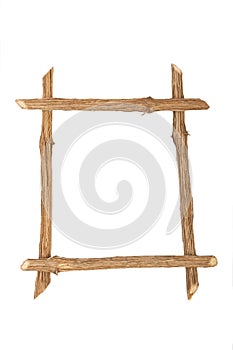 The frame for the picture made from rough pine logs, isolated on