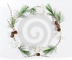 Frame pine tree branches cones Christmas holidays flat lay