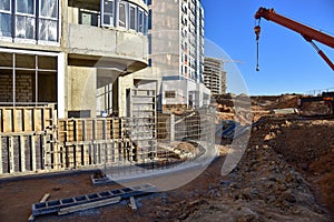 Frame of reinforcement for pouring the formwork of the porch at the entrance of a residential building. Preparatory work for