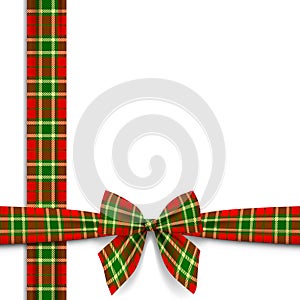Frame of ribbon and bow in tartan style ornament isolated on white background