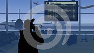 The frame shows an airport with a waiting room. A woman in silhouette looks at the scoreboard and checks the flights