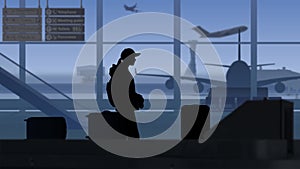 The frame shows an airport with a waiting room. A woman is waiting for his luggage while it is checked by X ray scanners