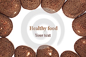 Frame from slices of black rye bread on a white background. Isolated. Food background.
