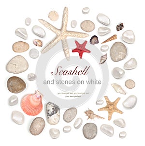 Frame of stones and seashell on white