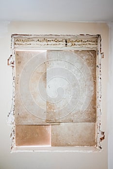 Frame torn from a window in the interior of a room in some remodeling works of the house