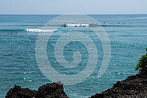 A-Frame wave at surf spot Baby Padang on Bukit Peninsula, Bali, Indonesia